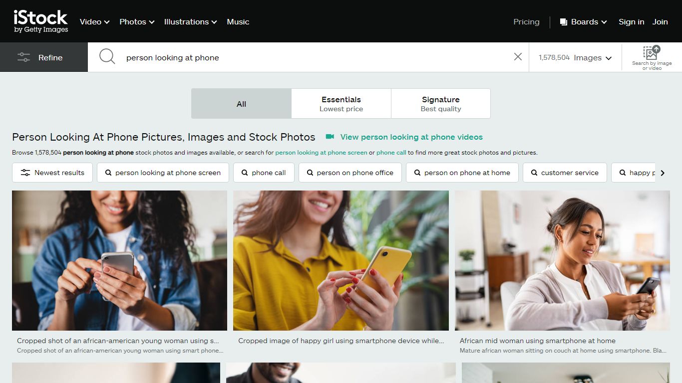 Person Looking At Phone Pictures, Images and Stock Photos