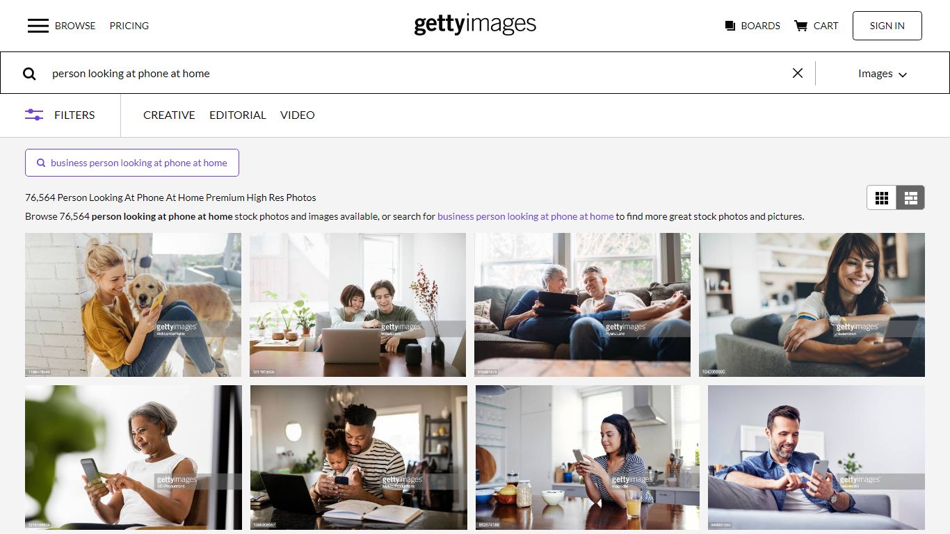 75,532 Person Looking At Phone At Home Premium High Res Photos